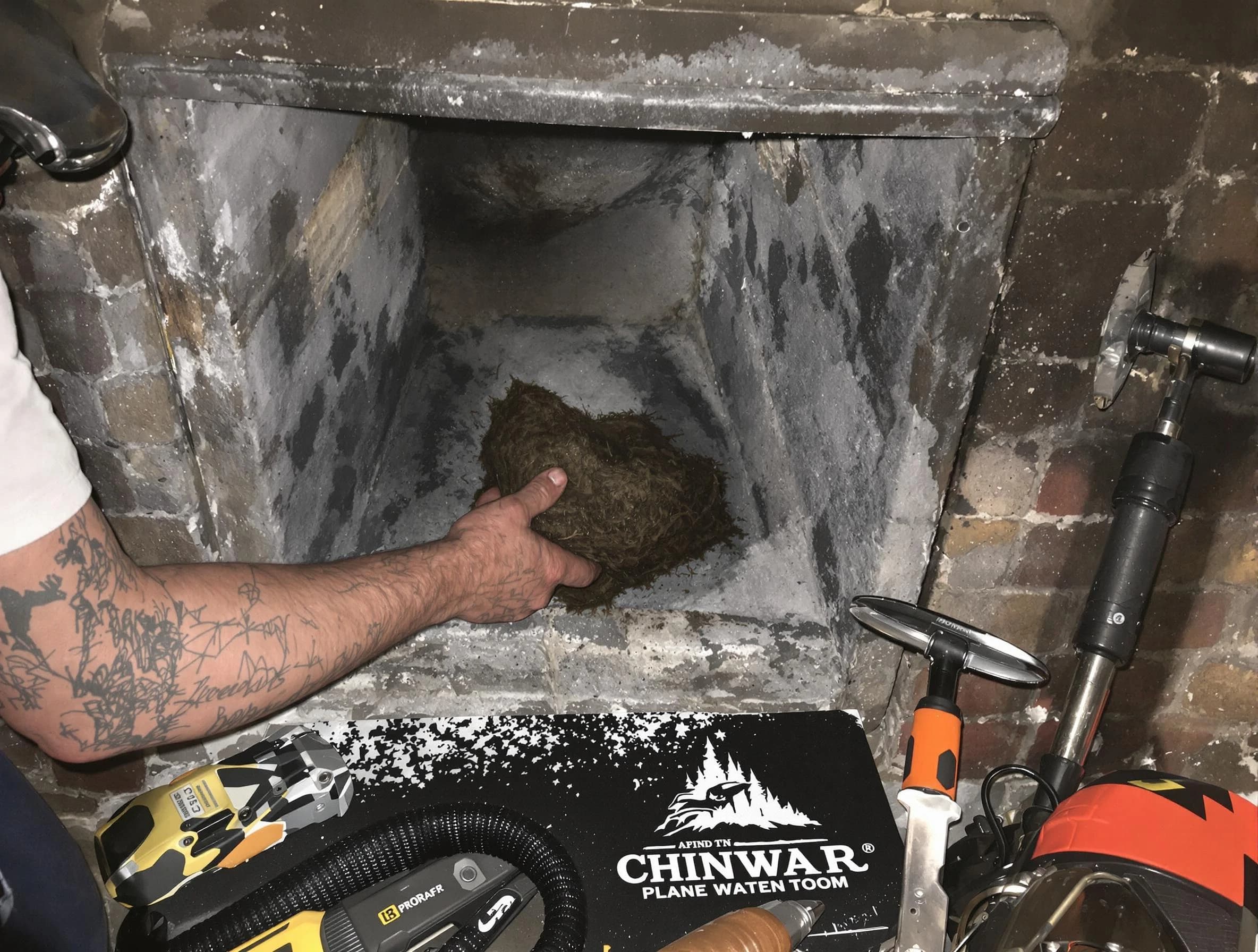 Vineyard Chimney Sweep safely removing debris and screening chimney in Vineyard, UT